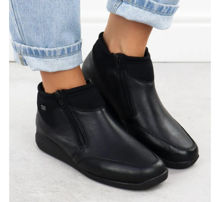 Dámské kožené nepromokavé pohodlné boty černé model 21905394 - Rieker