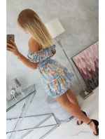 Květinové šaty s odhalenými rameny v modré barvě Květinové šaty s odhalenými rameny v modré barvě