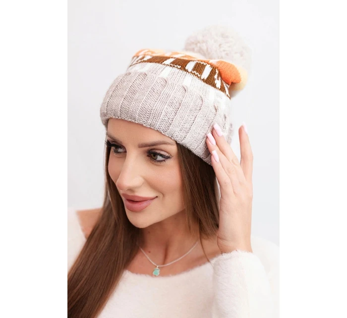 Dámská zimní čepice s vlnou a nápisem s velkým pomponem K422 béžová Dámská zimní čepice s vlnou a nápisem s velkým pomponem K422 béžová