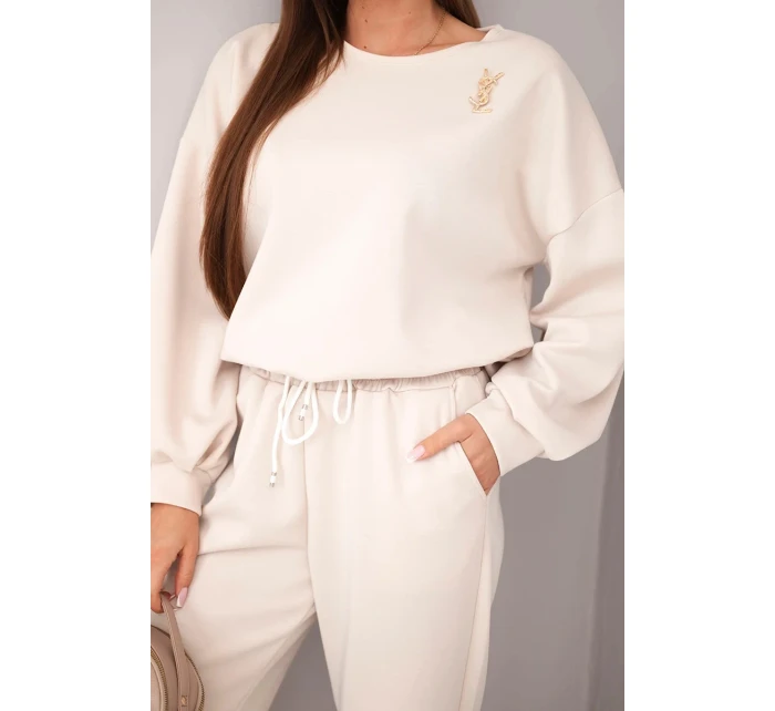 Dámský komplet máslová mikina s broží a kalhoty s rovnou nohavicí béžový