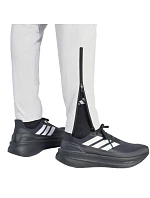 Pánské kalhoty Tiro 26 Travel Woven světle šedé model 22062493 - ADIDAS