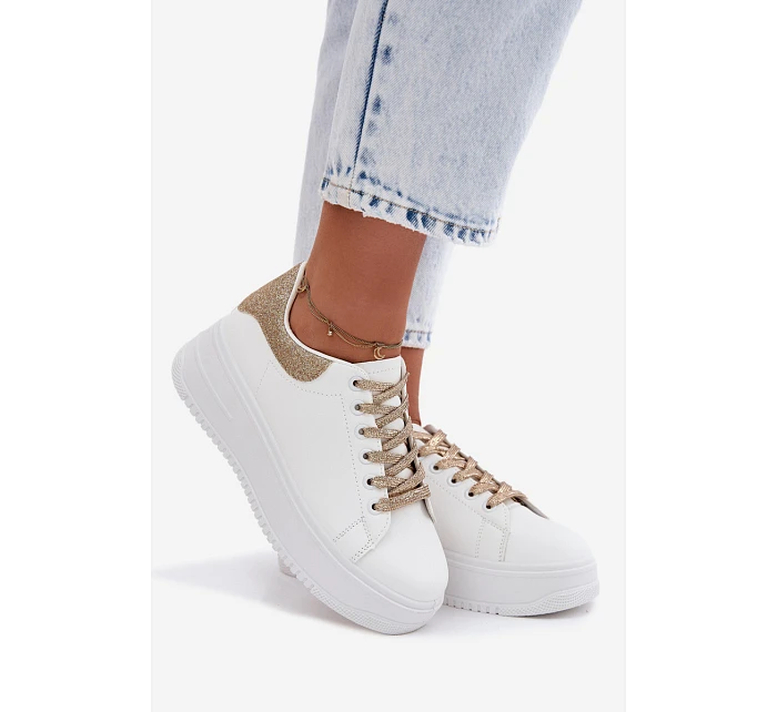 Dámské tenisky na platformě z imitace kůže bílo-zlaté se třpytkami Calinae Dámské tenisky na platformě z imitace kůže bílo-zlaté se třpytkami Calinae