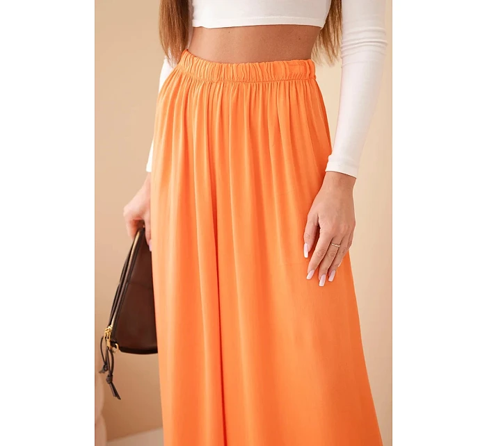 Dámské široké viskózové kalhoty s gumou v pase oranžové
