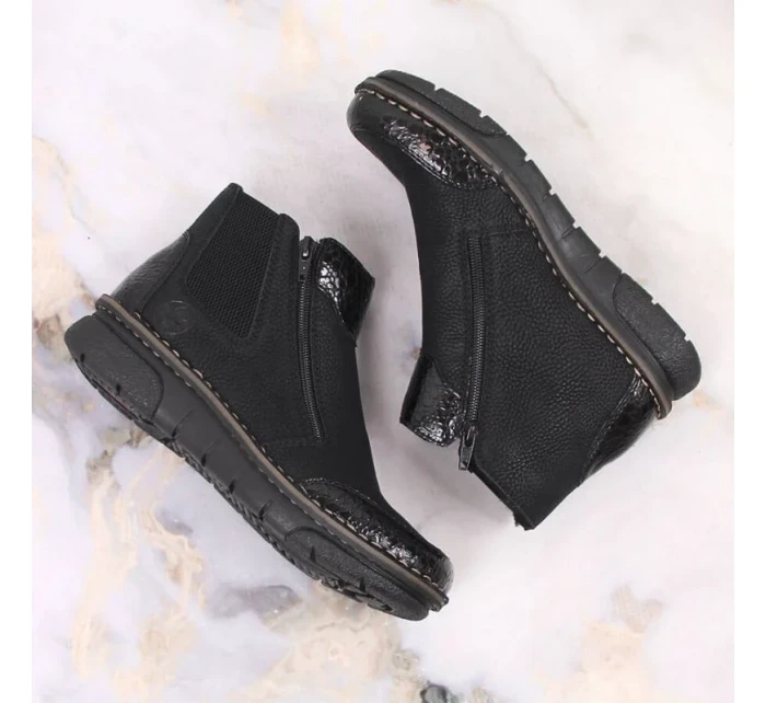 Pohodlné zateplené boty na zip Rieker W RKR555 Pohodlné zateplené boty na zip Rieker W RKR555