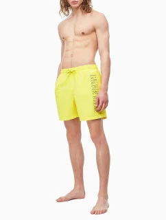 Pánské plavecké šortky KM0KM00381-ZAM žlutá - Calvin Klein
