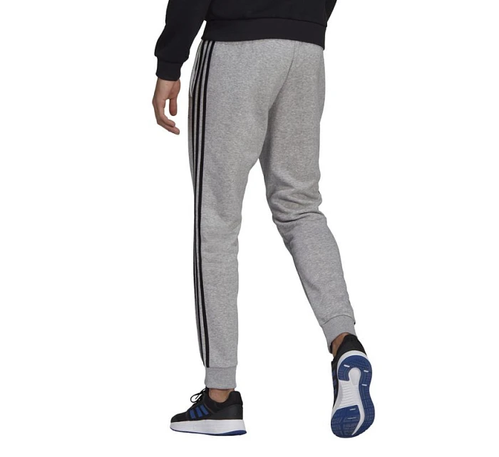 Pánské kalhoty Essentials Fleece M model 16053227 - ADIDAS Pánské kalhoty Essentials Fleece M model 16053227 - ADIDAS