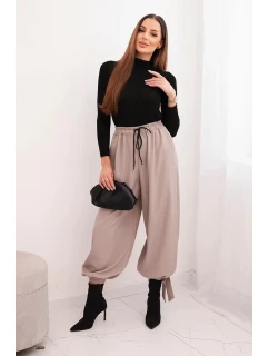 Dámské kalhoty se širokými nohavicemi a zavazováním dole fango