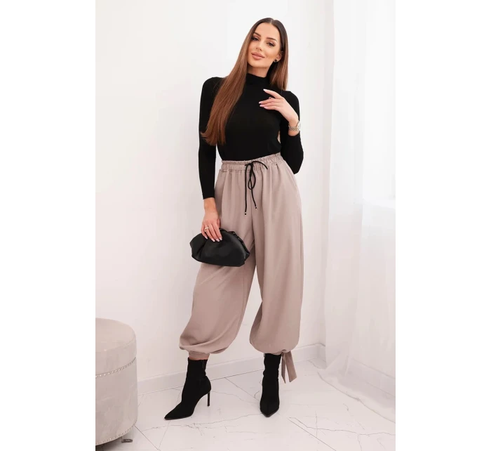 Dámské kalhoty se širokými nohavicemi a zavazováním dole fango
