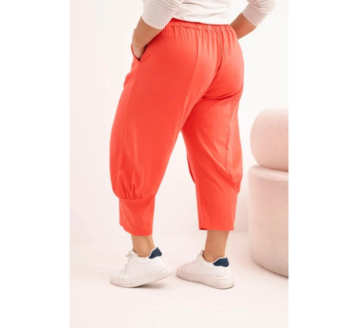 Dámské kalhoty Plus Size s nízkým sedem a gumou v pase korálové