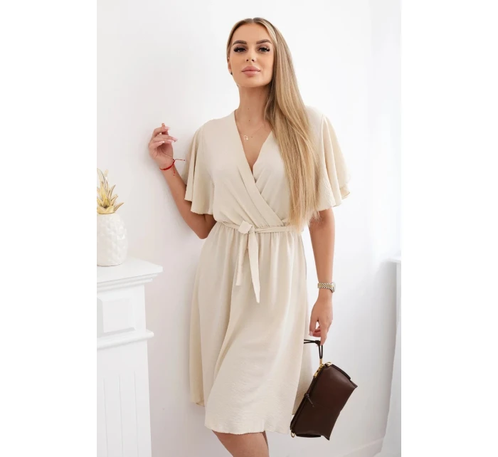 Šaty s vrstveným výstřihem béžový