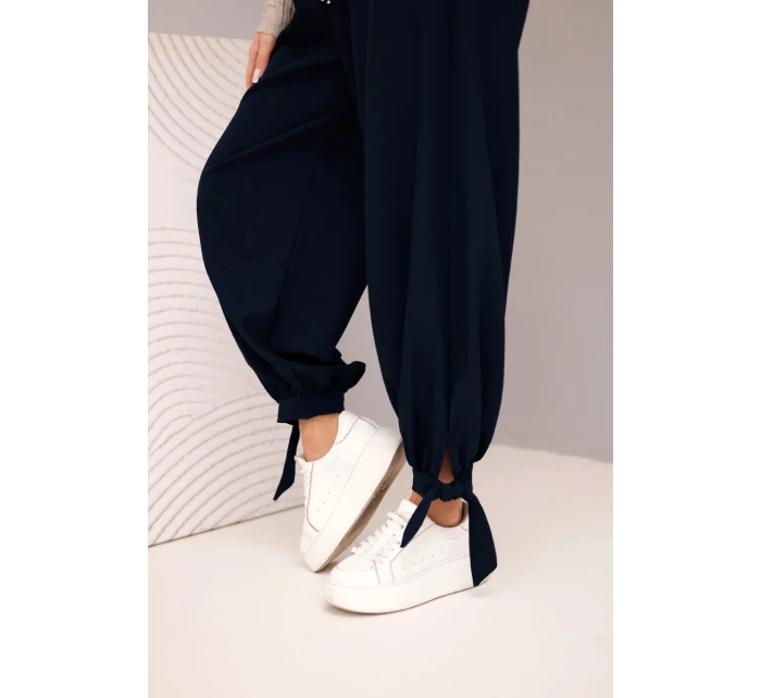 Dámské kalhoty s širokým nohavicí a vázáním dole modré