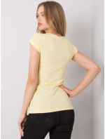 Světle žluté dámské tričko s aplikací