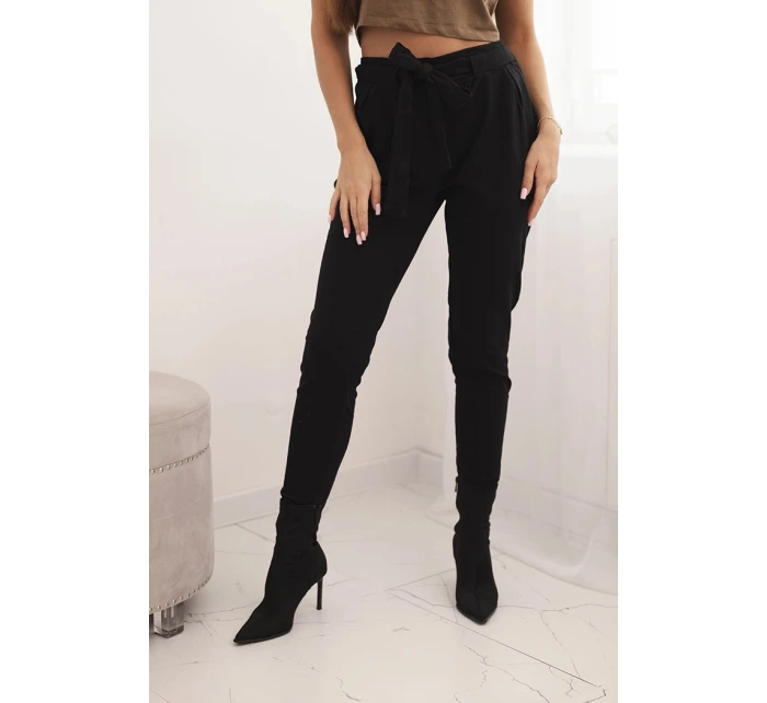 Dámské bavlněné kalhoty s v pase a nohavicí černé model 21768708 - K-Fashion Dámské bavlněné kalhoty s v pase a nohavicí černé model 21768708 - K-Fashion