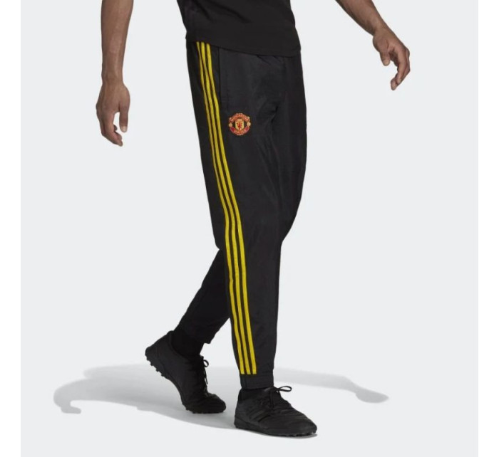 Kalhoty Manchester United Tkané kalhoty Icon M model 19059522 - ADIDAS
