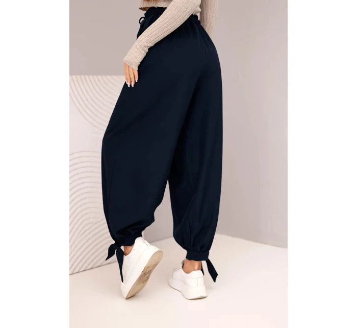 Dámské kalhoty s širokým nohavicí a vázáním dole modré