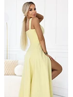 dlouhé šaty s rozparkem a výstřihem typu  žluté s třpytkami model 22092786 - numoco
