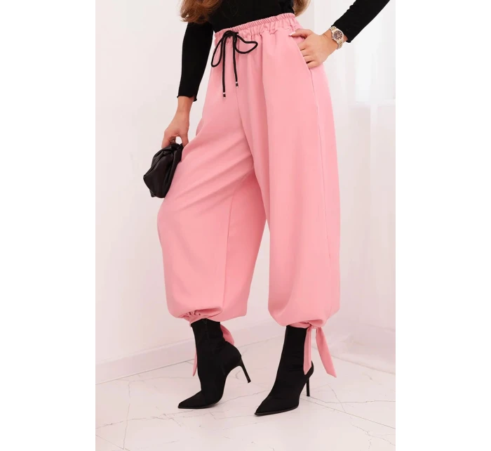 Dámské kalhoty s širokým nohavicí a vázáním dole světle růžové Dámské kalhoty s širokým nohavicí a vázáním dole světle růžové