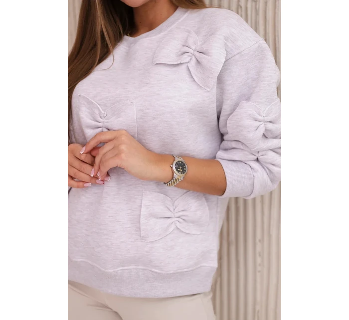 Zateplená mikina se stahovacím lemem a ozdobnými mašličkami béžová melanž