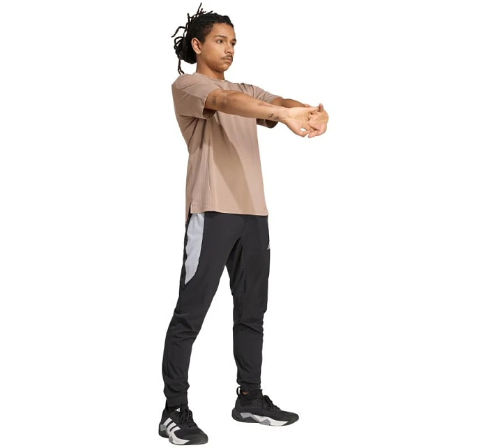 Pánské kalhoty Tech černé model 22096877 - ADIDAS Pánské kalhoty Tech černé model 22096877 - ADIDAS