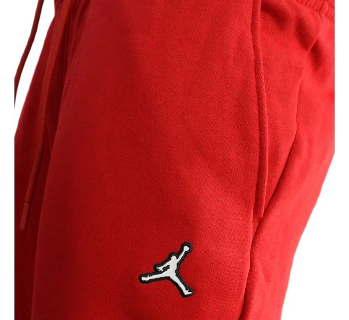 Pánské sportovní kalhoty Air Jordan Brooklyn Essential Fleece červené - DQ7340-687