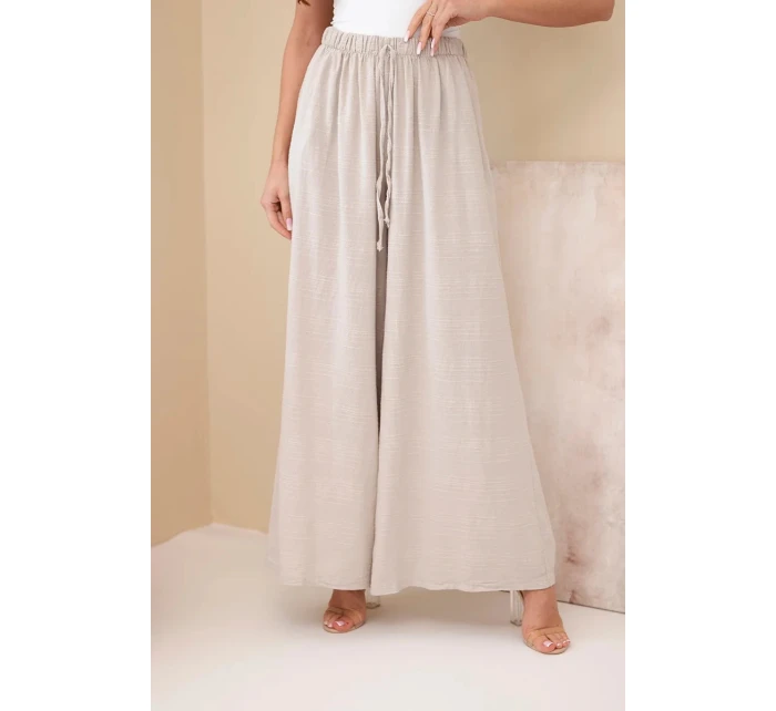 Dámské široké bavlněné kalhoty s gumičkou v pase béžové