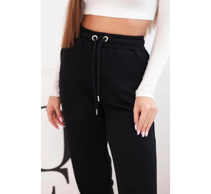 Dámské bavlněné kalhoty s gumou v pase černé Dámské bavlněné kalhoty s gumou v pase černé