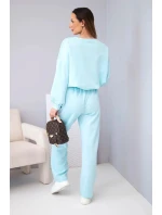 Dámský komplet máslová mikina s broží a kalhoty s rovnými nohavicemi model 22030082 - K-Fashion