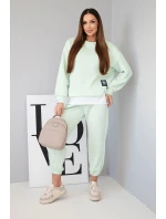 Dámský komplet s volnou mikinou a tepláky jasně mátová model 21808631 - K-Fashion Dámský komplet s volnou mikinou a tepláky jasně mátová model 21808631 - K-Fashion