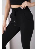 Dámské teplákové kalhoty s vysokým pasem a šňůrkou černé Dámské teplákové kalhoty s vysokým pasem a šňůrkou černé