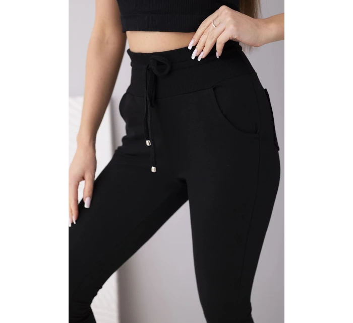 Dámské teplákové kalhoty s vysokým pasem a šňůrkou černé Dámské teplákové kalhoty s vysokým pasem a šňůrkou černé