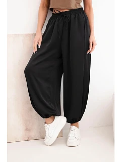 Dámské široké kalhoty s gumou v pase a vázáním ve stylu model 22064413 černé - K-Fashion