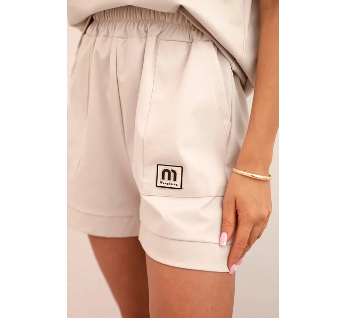 Dámská punto souprava s krátkým rukávem a volnými šortkami beżowy Dámská punto souprava s krátkým rukávem a volnými šortkami beżowy