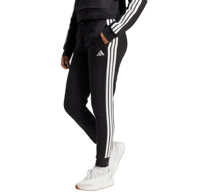 Kalhoty Essentials 3Stripes Fleece Slim W model 21288029 dámské - ADIDAS Kalhoty Essentials 3Stripes Fleece Slim W model 21288029 dámské - ADIDAS