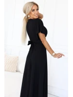 dlouhé šaty s rozparkem na rukávy a výstřihem černé model 21290293 - numoco