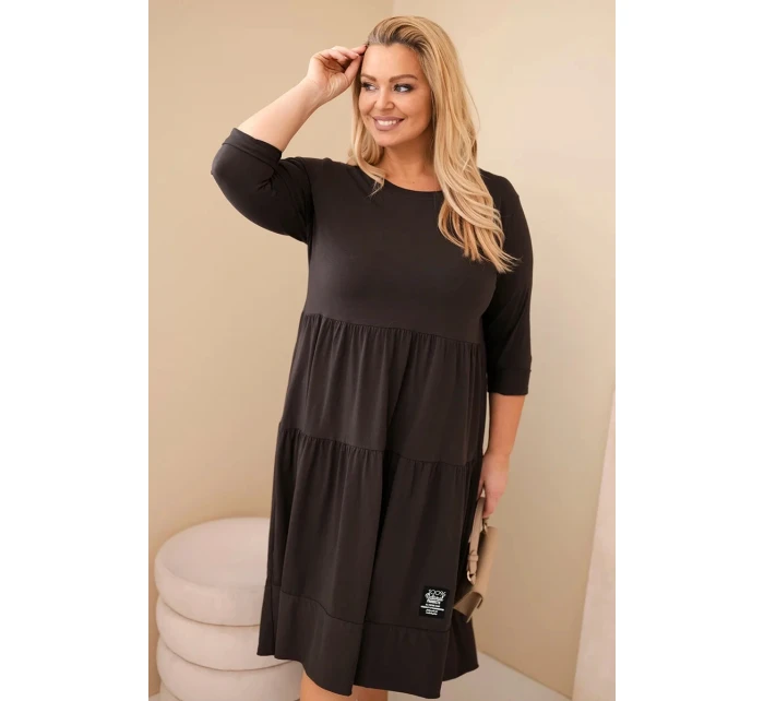 Dámská bavlněná sukni Plus Size s volánky a ohrnutým rukávem hnědá Dámská bavlněná sukni Plus Size s volánky a ohrnutým rukávem hnědá