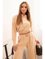Dámská souprava z veluru se širokými nohavicemi a mikinou s kapucí béžová Dámská souprava z veluru se širokými nohavicemi a mikinou s kapucí béžová