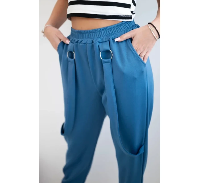 Kalhoty s ozdobnými proužky máslové látky džínovina