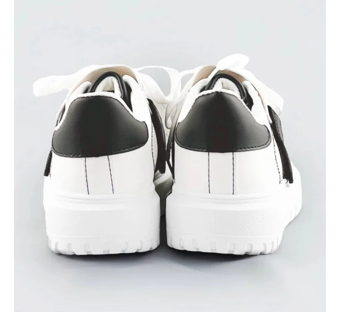 Bílo-černé dámské sportovní boty se zakrytým šněrováním (RA2049) Bílo-černé dámské sportovní boty se zakrytým šněrováním (RA2049)