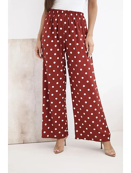 Dámské široké kalhoty s puntíky s gumou v pase na léto model 22205747 - K-Fashion Dámské široké kalhoty s puntíky s gumou v pase na léto model 22205747 - K-Fashion