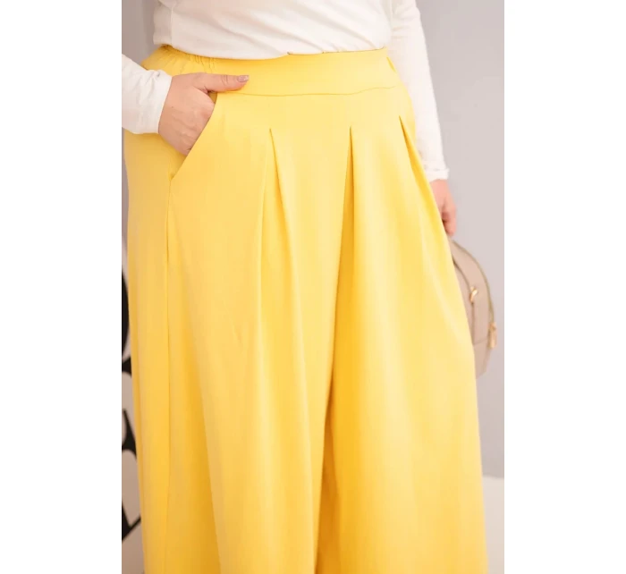 Dámské bavlněné kalhoty Plus Size s širokým střihem a volným střihem žluté Dámské bavlněné kalhoty Plus Size s širokým střihem a volným střihem žluté
