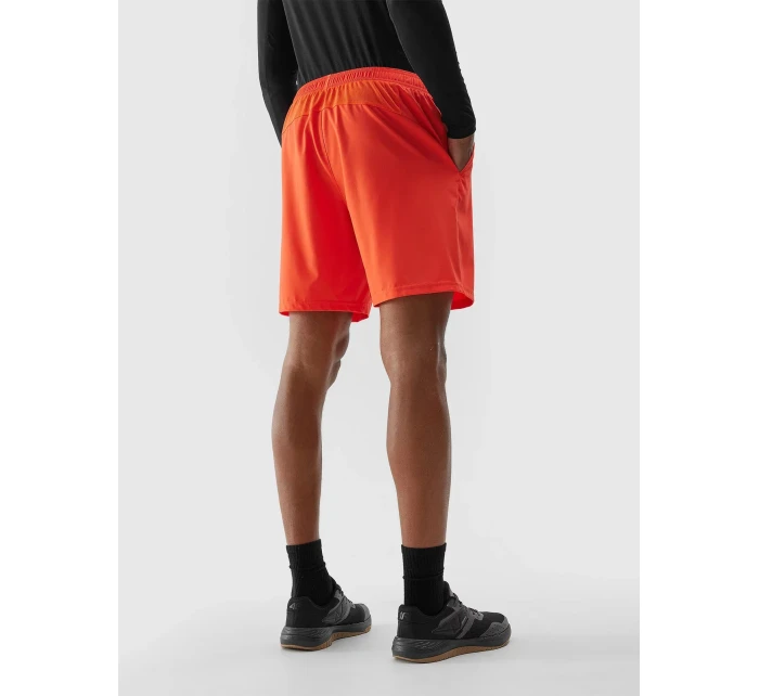 Pánské sportovní šortky z recyklovaných materiálů 4F - oranžové Pánské sportovní šortky z recyklovaných materiálů 4F - oranžové