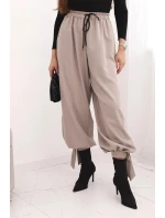 Dámské kalhoty se širokými nohavicemi a zavazováním dole fango