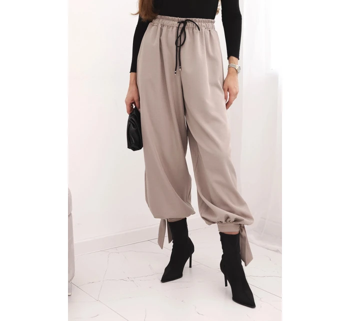 Dámské kalhoty se širokými nohavicemi a zavazováním dole fango