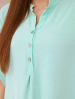 Halenka s prodlouženým zadním dílem mincovna