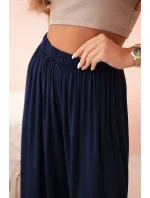 Široké dámské viskózové kalhoty s elastickým pasem tmavě modré Široké dámské viskózové kalhoty s elastickým pasem tmavě modré