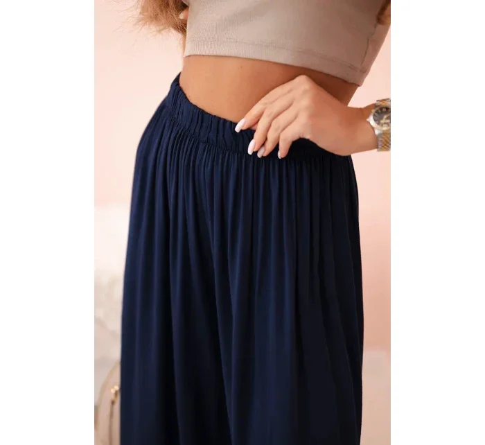 Široké dámské viskózové kalhoty s elastickým pasem tmavě modré Široké dámské viskózové kalhoty s elastickým pasem tmavě modré