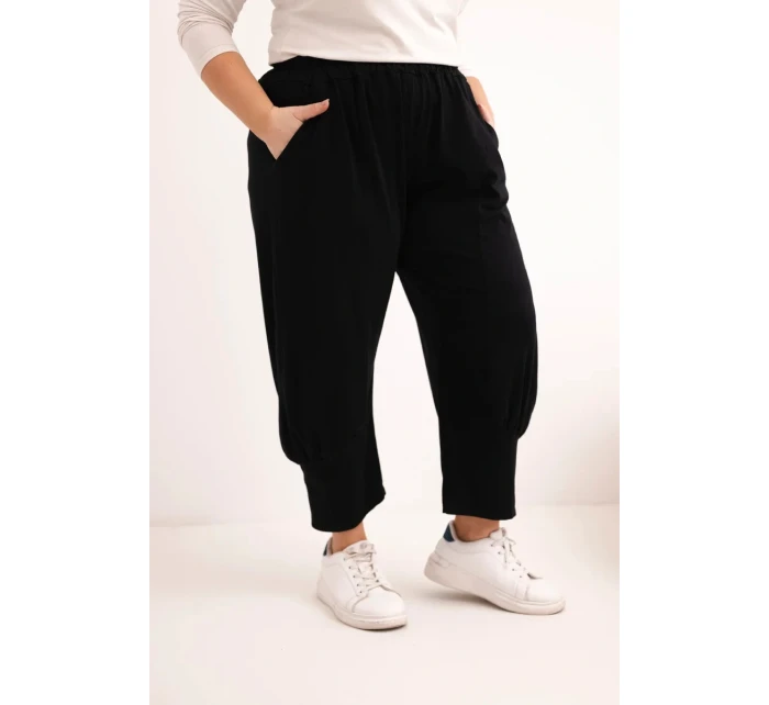 Dámské kalhoty Plus Size s nízkým sedem a gumou v pase černé
