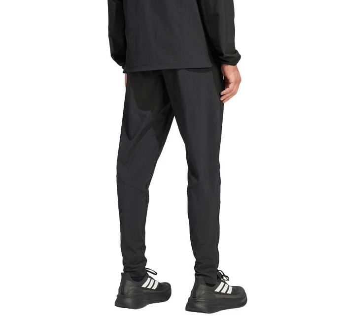 Pánské kalhoty Tiro 26 Travel Woven černé model 22062461 - ADIDAS Pánské kalhoty Tiro 26 Travel Woven černé model 22062461 - ADIDAS