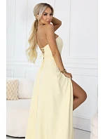maxi šaty s rozparkem a zavazováním na zádech žluté model 22064816 - numoco maxi šaty s rozparkem a zavazováním na zádech žluté model 22064816 - numoco