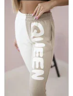 Dámské tepláky s nápisem QUEEN béžový